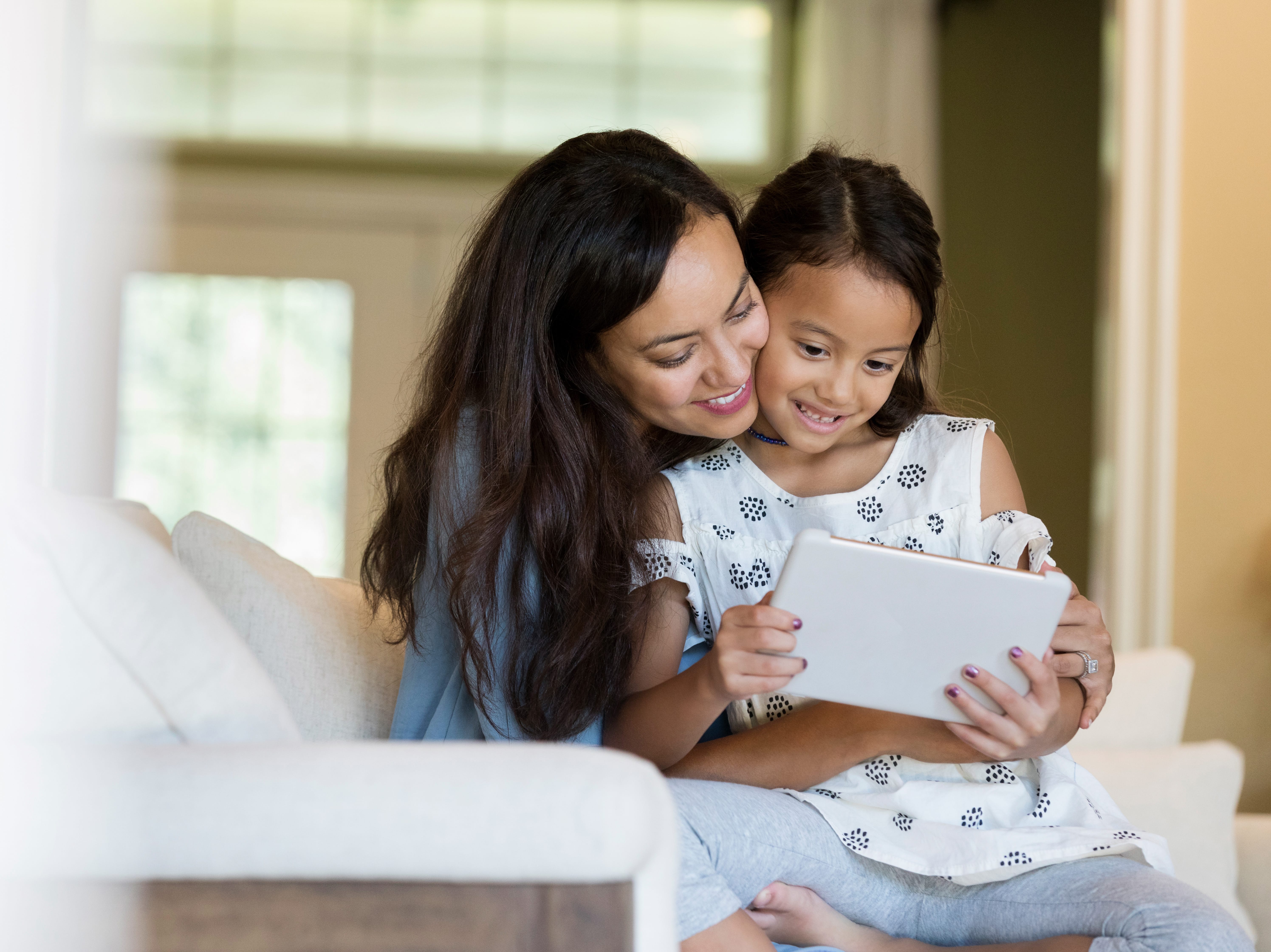 Mother & Daughter with Tablet